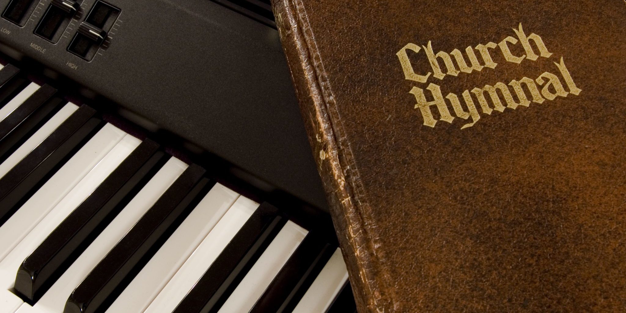bigstock-Hymnal-And-Keyboard-890286